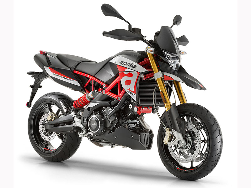 The light, powerful supermoto-style Dorsoduro 900 has a tall seat, a small gas tank and the potential to get you on a first-name basis with the local constabulary.